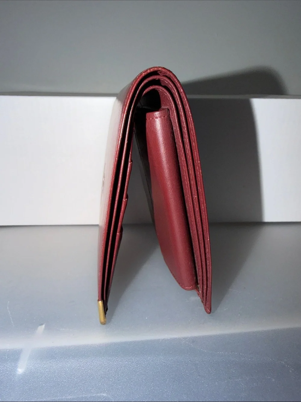 Cartier Must de Cartier Leather Bifold Wallet in Burgundy with Gold Corners